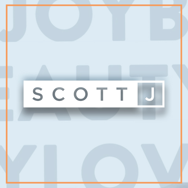 Eye test chart with the name "Scott" in focus at a salon. - Scott J Salons in New York, NY